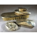 Collection of hallmarked silver items to include a clothes brush, hammered glasses case, nail file