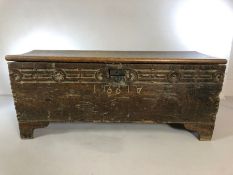 Small carved oak coffer, engraved to front 1661, approx 93cm x 31cm x 39cm tall (A/F)