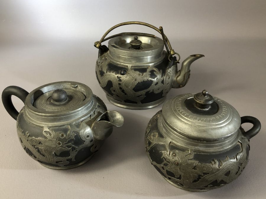 Chinese pewter and pottery part tea set by Hsin Ho Cheng, tallest approx 10.5cm (one teapot handle