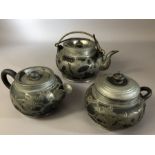 Chinese pewter and pottery part tea set by Hsin Ho Cheng, tallest approx 10.5cm (one teapot handle