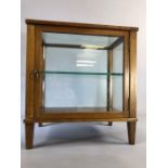 Small wooden and glass display case with original key and glass inner shelf, approx 36cm x 26cm x