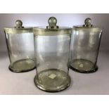 Three lidded vintage glass storage jars, each approx 28cm in height