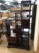 Modern dark wood shelving unit/ room divider with six double sided drawers and open shelves,