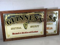 Two vintage Guinness advertising / pub mirrors, the largest approx 98cm x 67cm