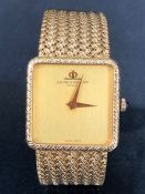 BAUME & MERCIER GENEVE swiss made 18ct Gold wristwatch with woven 18ct Gold strap. Plain gold face