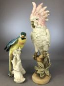 Royal Dux ceramic cockatoo (A/F), approx 41cm tall and a ceramic parrot approx 25cm in height