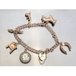 Silver Charm Bracelet with silver chinese token, and silver heart shaped lock