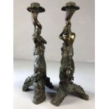 Pair of Bronze Victorian male and female Centaurs wearing the full skins of Lions on tripod bases (