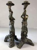 Pair of Bronze Victorian male and female Centaurs wearing the full skins of Lions on tripod bases (