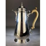Silver hallmarked Coffee pot with Bone handle hallmarked for London by D & J WELLBY approx 22cm tall