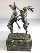 Pair of French Bronze fighting/ Boxing Hares on marble base with a foundary plaque with initials J.B