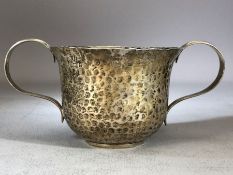 Hallmarked silver hammered two handled loving cup Birmingham 1905 by William Aitken approx 10cm