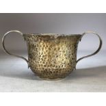 Hallmarked silver hammered two handled loving cup Birmingham 1905 by William Aitken approx 10cm