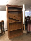 Large pine bookcase with five shelves, approx 28cm x 105cm x 216cm tall (A/F)