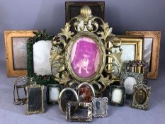 Collection of decorative vintage photo frames in varying designs, materials and sizes