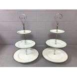 Pair of oversized three tier metal cake stands, each approx 83cm in height