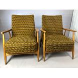 Pair of retro Mid Century armchairs on tapered legs, possibly of Hungarian deign