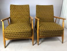 Pair of retro Mid Century armchairs on tapered legs, possibly of Hungarian deign