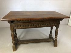 Three plank oak jointed table on turned legs with cross stretcher, engraved I.D to end, approx