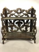 Small carved wooden folding shelf