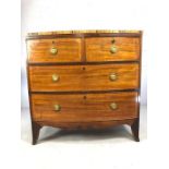 Bow fronted chest of four drawers with brass circular handles, intricate inlay and original key,