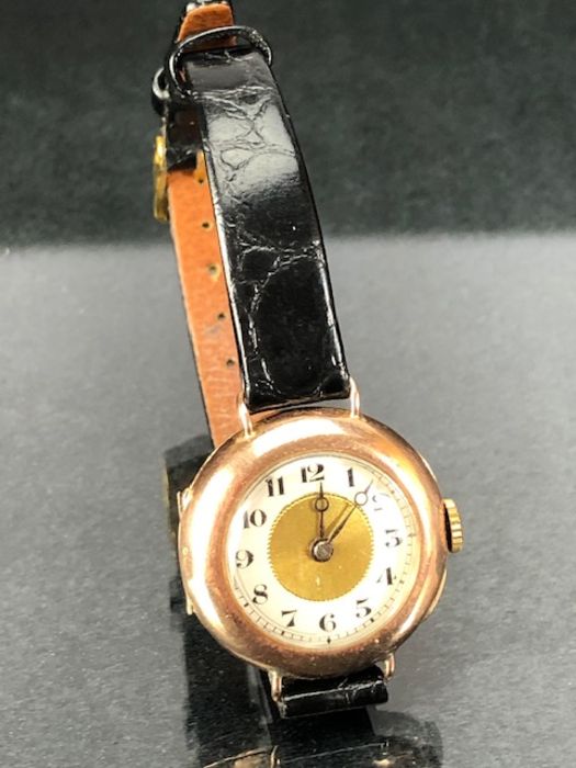 9ct Gold watch with Gold centre section to face