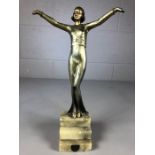 Art Deco figurine of a lady on stepped marble base with silver coloured shield shaped plaque to base