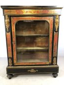 French 19th Century Boule and Ormolu mounted display cabinet with single glazed door enclosing a