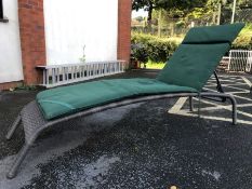 Modern rattan-style garden recliner / sun lounger by Hartman (slight split to top edge) with