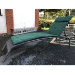 Modern rattan-style garden recliner / sun lounger by Hartman (slight split to top edge) with