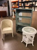 Collection of painted wicker items to include chair, coffee table and shelving unit