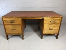 Large 1950s desk with red desk top inlay and four drawers, approx 84cm x 169cm x 77cm tall