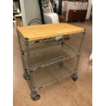 Metal industrial-style kitchen trolley with wooden top