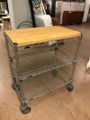 Metal industrial-style kitchen trolley with wooden top
