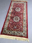 Small red ground Kashmir rug / runnner, approx 45cm x 67cm