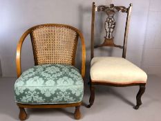 Upholstered Victorian child's chair with wicker work back on turned front feet and a carved oak