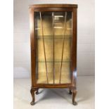 Art Deco display cabinet in the starburst design, with two shelves, approx 58cm x 31cm x 128cm tall