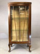 Art Deco display cabinet in the starburst design, with two shelves, approx 58cm x 31cm x 128cm tall