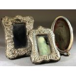 Three Miniature Silver hallmarked Photo frames with Repoussé decoration (the larger 9 x 7cm)