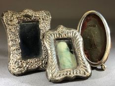 Three Miniature Silver hallmarked Photo frames with Repoussé decoration (the larger 9 x 7cm)