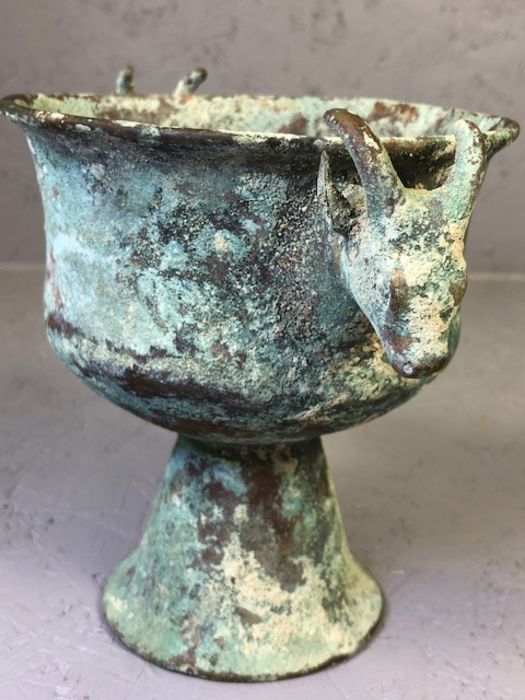 Ancient Luristan / Middle Eastern bronze vessel on pedestal base with rams heads, approx 16cm tall - Image 5 of 9