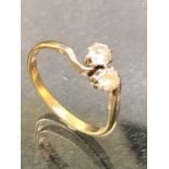 18ct Gold Diamond Ring with Two intertwined Diamonds each approx 0.25ct size 'R'