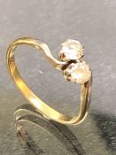 18ct Gold Diamond Ring with Two intertwined Diamonds each approx 0.25ct size 'R'
