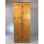 Pine two door wardrobe with hanging rail and shelf, approx 73cm x 51cm x 180cm tall