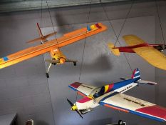 Collection of model airplanes and equipment, to include four planes (one boxed), controllers,