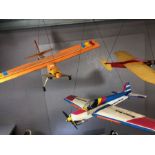 Collection of model airplanes and equipment, to include four planes (one boxed), controllers,