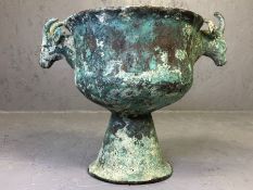 Ancient Luristan / Middle Eastern bronze vessel on pedestal base with rams heads, approx 16cm tall