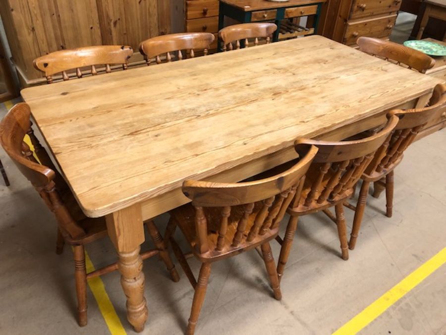 Pine farmhouse style dining table with drawer to one end and turned legs, approx 183cm x 90cm x 77cm