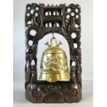 Chinese brass gong depicting dragons in a carved wooden frame, approx 39cm in height