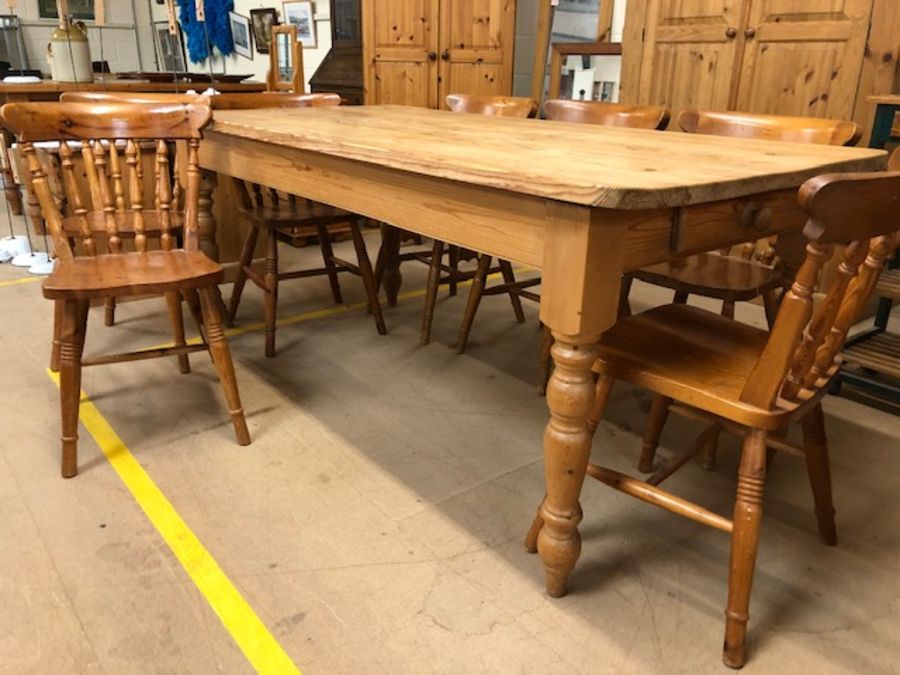 Pine farmhouse style dining table with drawer to one end and turned legs, approx 183cm x 90cm x 77cm - Image 3 of 6